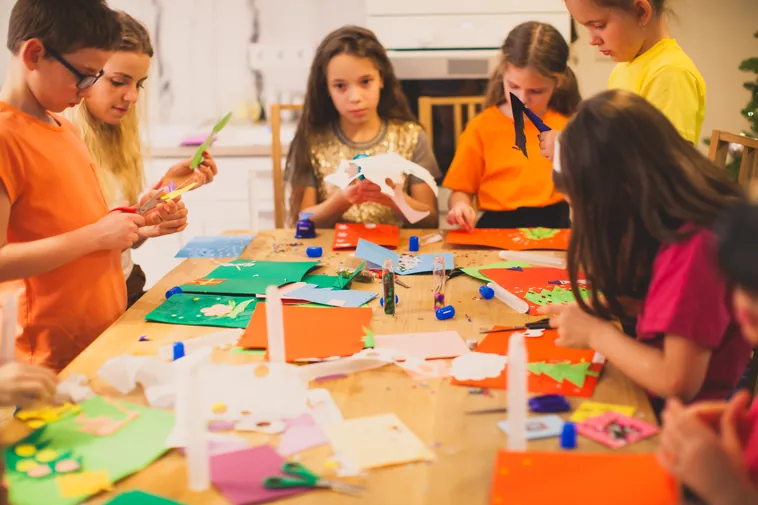 Children using assistive learning materials