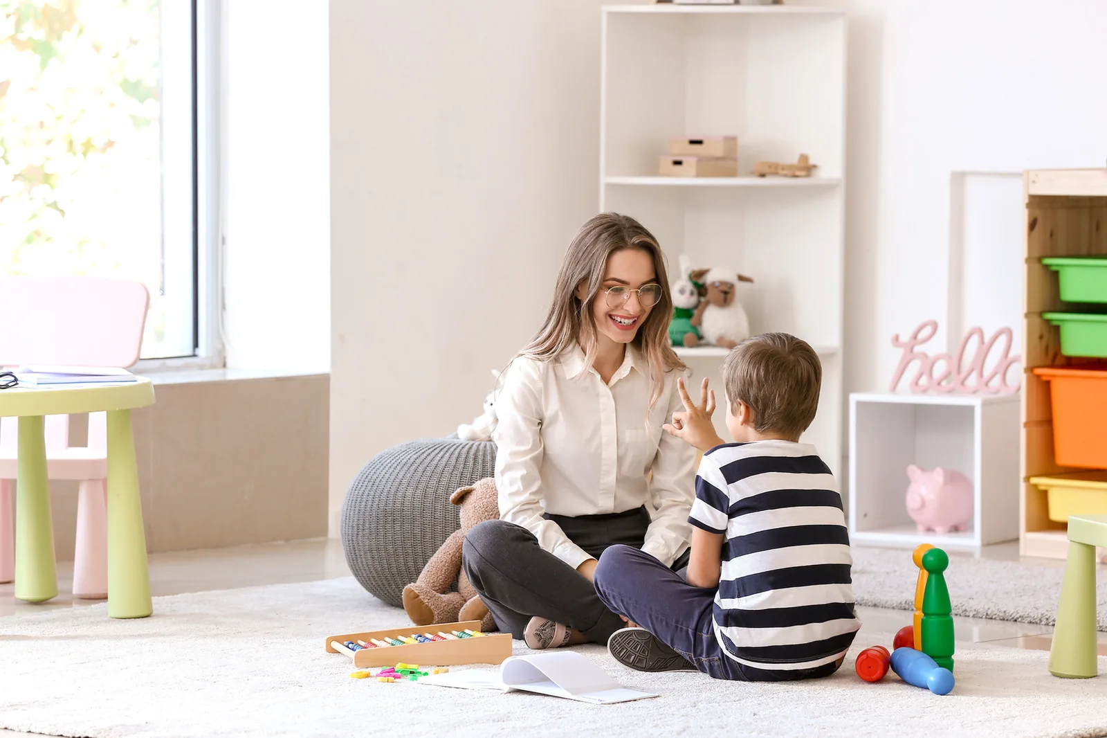 little boy at speech therapist office